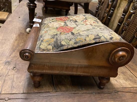 A pair of Victorian mahogany framed tapestry topped gout stools and a later Victorian button backed nursing chair